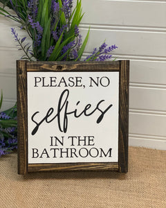 Please no selfies in the bathroom