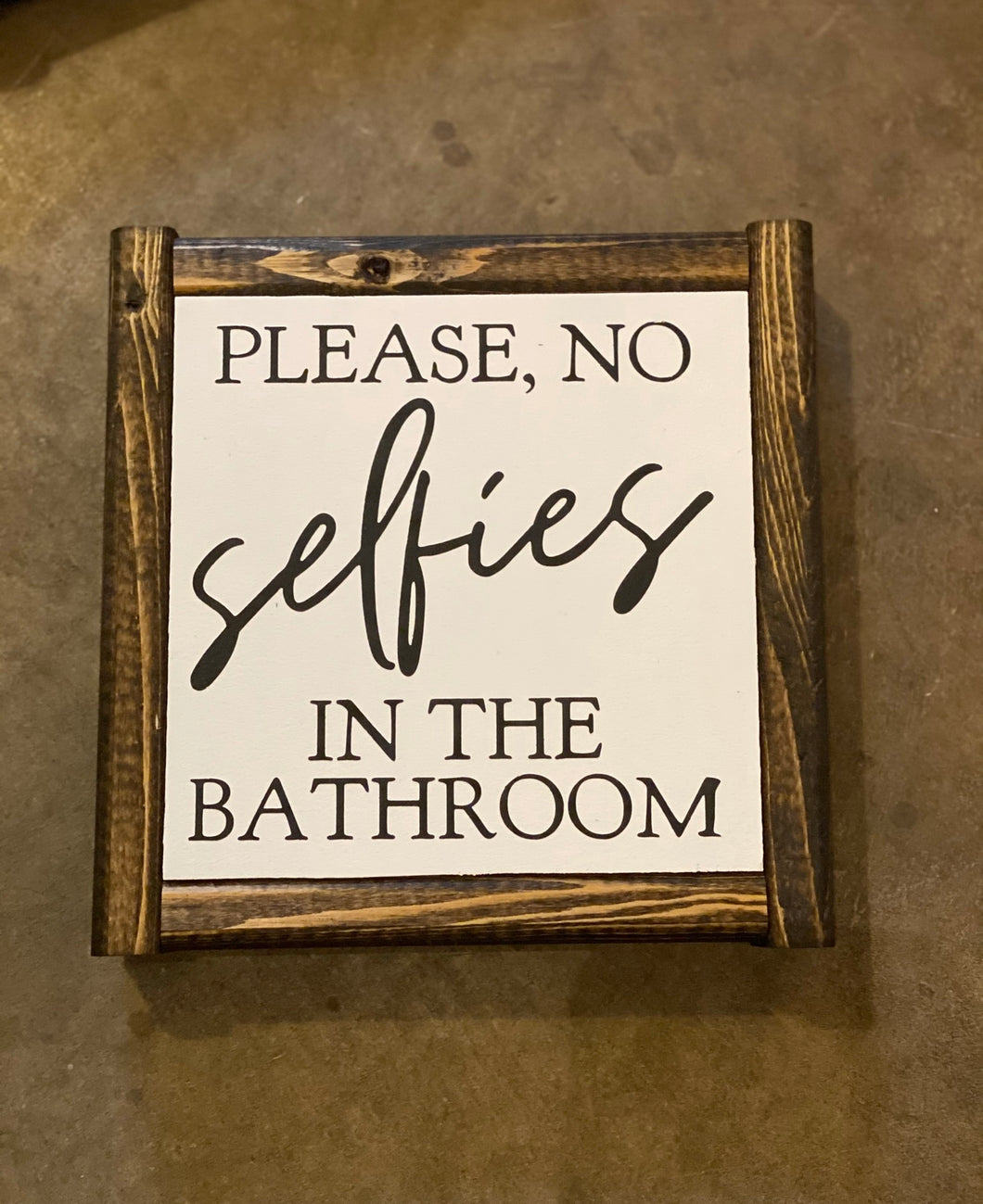 Please no selfies in the bathroom
